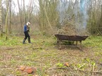 Billy loading coppice brash on to a burning tray 2026-03-08 (4615)
